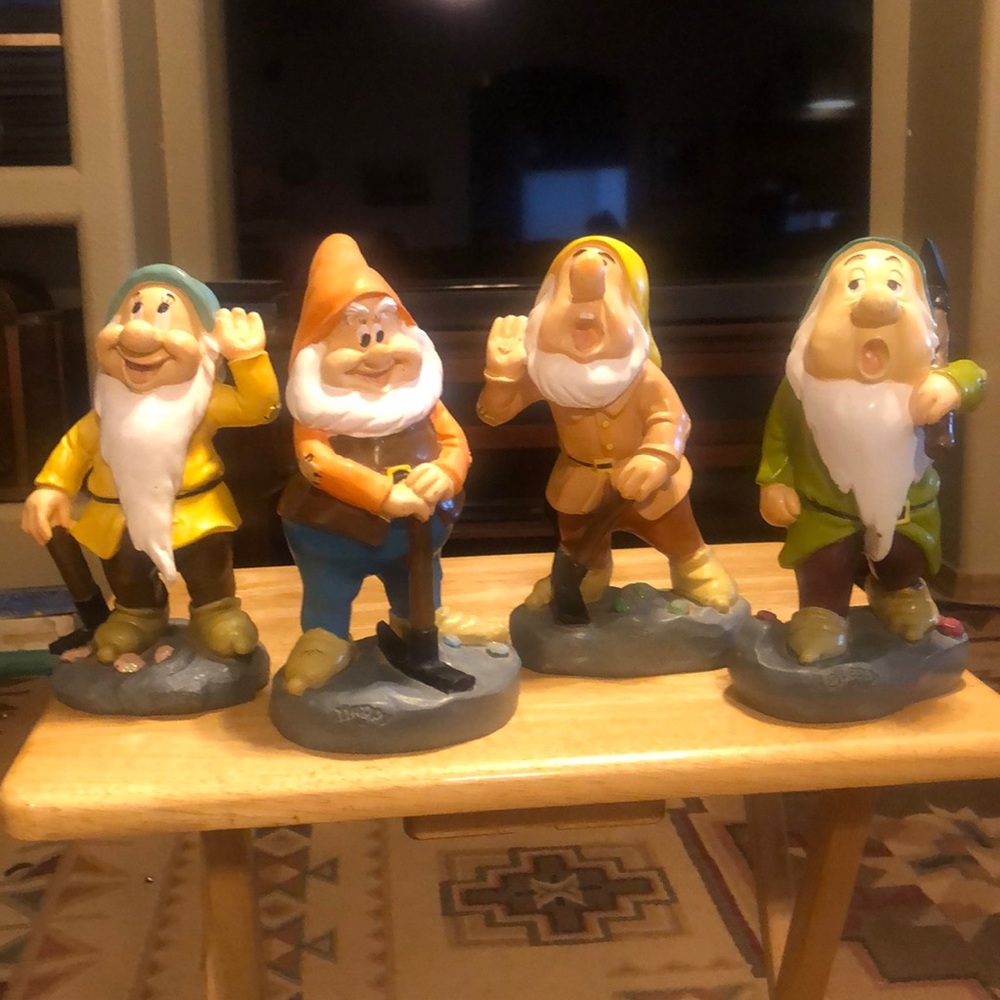 4 of the 7 Dwarves garden gnomes